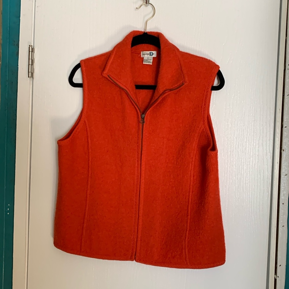 Paul Harris Design ( remember them?). Great orange wool vest in good condition